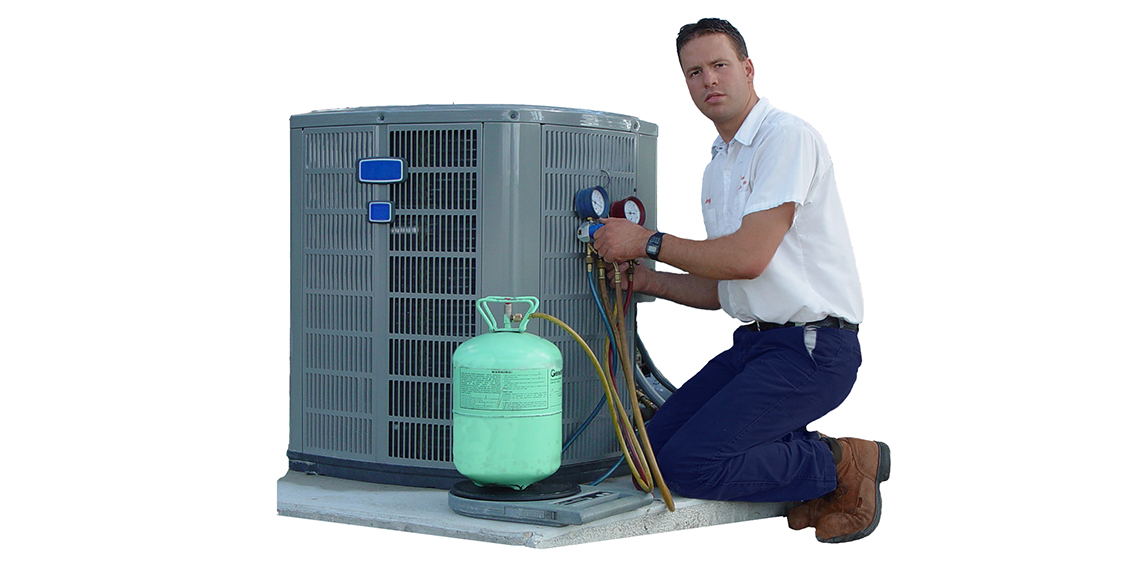 Technician working on a HVAC unit